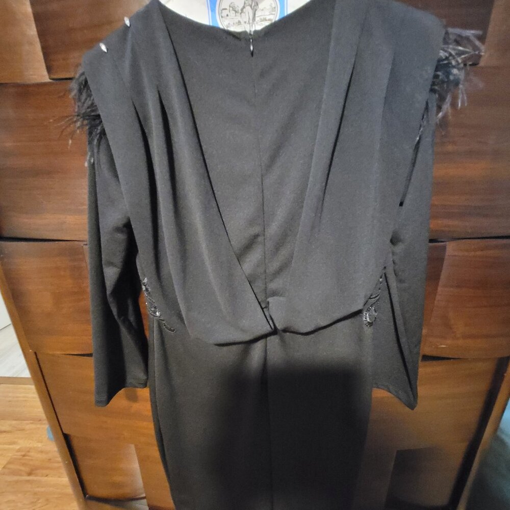 Feathered evening dress,mermaid silhouette